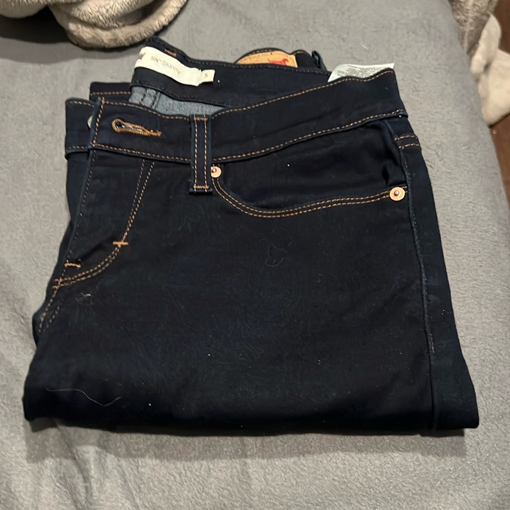 Levi’s size 5 dark blue with gold stitching